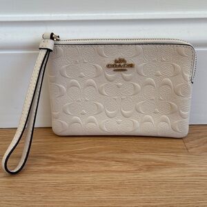 Coach Embossed Cream Wristlet